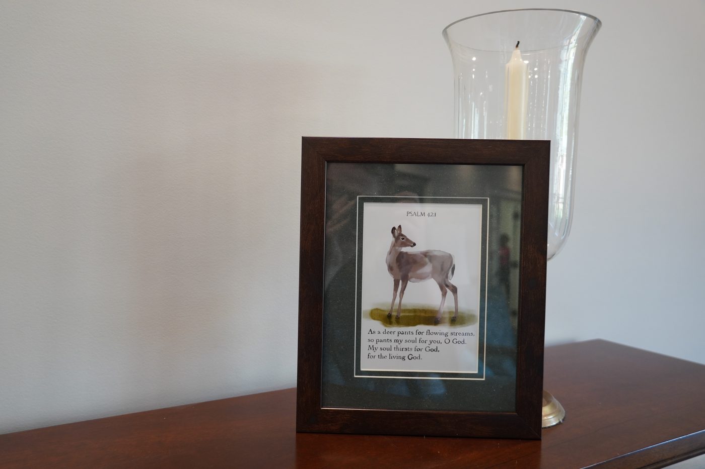 Framed calligraphy print of a deer with Psalm 42:1, on a dark wood frame